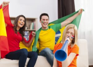 dutch-woman-blowing-by-vuvuzela-football-match-300x214 Newscrunch